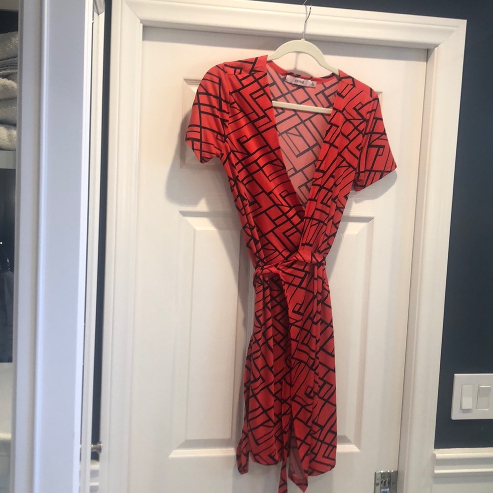 Coral and navy geometric wrap dress